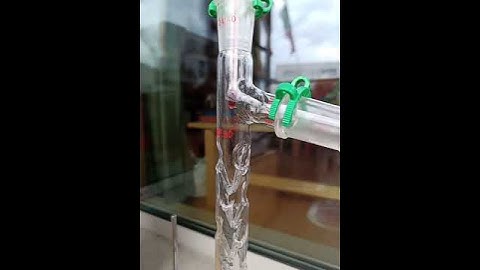 Fractional vacuum distillation of azeotropic acetone.