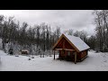 A cabin life is a simple life off grid log cabin  homesteading in northern wisconsin january 2024