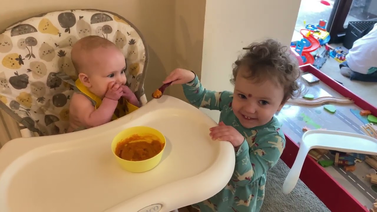 Gwendolyn Helps Feed Annalise First Food Oct 2024
