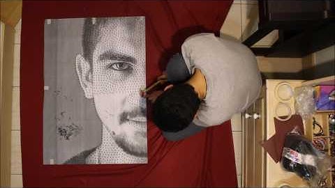making portrait with nails and thread (string art)