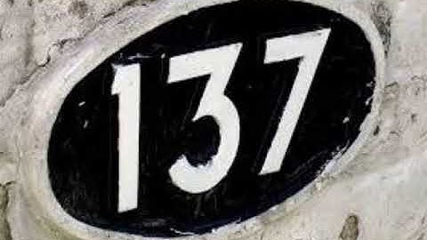 The Fine Structure Constant from the Proton Model