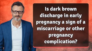 Is dark brown discharge in early pregnancy a sign of a miscarriage or other pregnancy complication