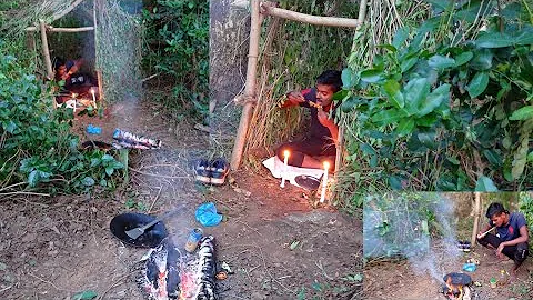 Building complete warm survival shelter/Bushcraft earth hut, grass roof and fireplace with clay