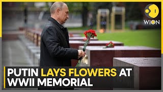 Putin laid a dozen red roses at martyrs of the Soviet Red Army monument | World News | WION