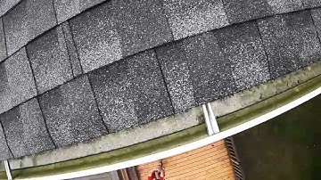 Using a GoPro to inspect gutters for debris and clogs