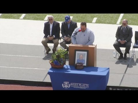 Lines stretch blocks as mourners gather for West Platte High School coach's memorial