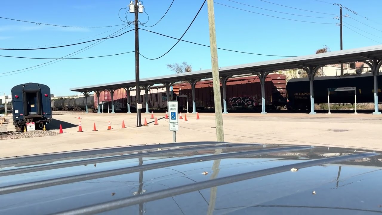 KCS 4847 ES44AC Trails At the Back Of The Long Mixed Train. At Houston Amtrak Station.
