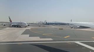 Emirates Boeing 777-300er leaving Dubai international airport to Amsterdam.