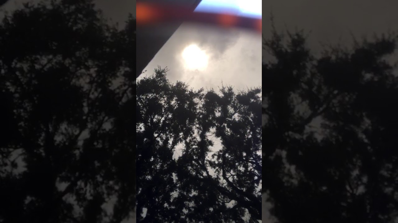 Rainy Solar Eclipse - YouTube