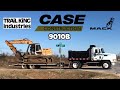 Loading and moving a case 9010b excavator with a trail king pintle hitch trailer