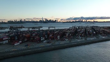Global Container Terminal, Hyperlapse with NYC & Statue of Liberty in Background at Sunrise
