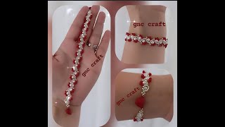 Kirmizi Kri̇stalli̇ Ve İnci̇li̇ Bi̇lekli̇k Red Crystal And Pearl Bracelet