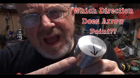 Which Direction Does Arrow On Motorized Bicycle 2 Stroke Piston Point / Go ?