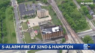 News Chopper 12 is back flying over the scene of a building fire at 32nd and Hampton