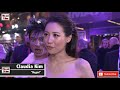 Ezra Miller photobombs Claudia Kim's red carpet interview at Fantastic Beasts 2 UK Premiere!