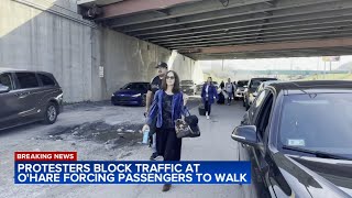 O'Hare Airport travelers walk to terminal as pro-Palestinian protesters block traffic