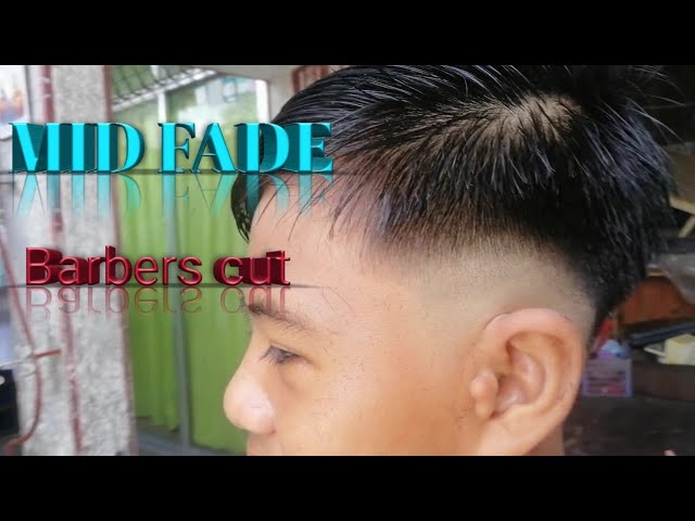 MID FADE/barbers cut#tutorial UcheTV