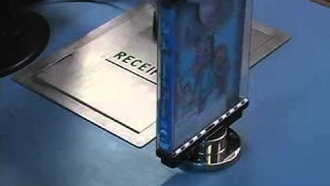 How to check out materials using the self-checkout machine-Spanish