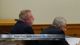 Former prison warden enters plea agreement to lesser charge in connection to 2 prisoners' deaths