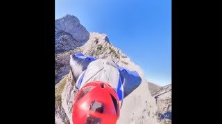 Footage Of A Skydiver Flying Off A High Mountain With A Parachute
