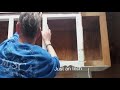 Mounting Old Kitchen Cabinet in Outside Building for Storage