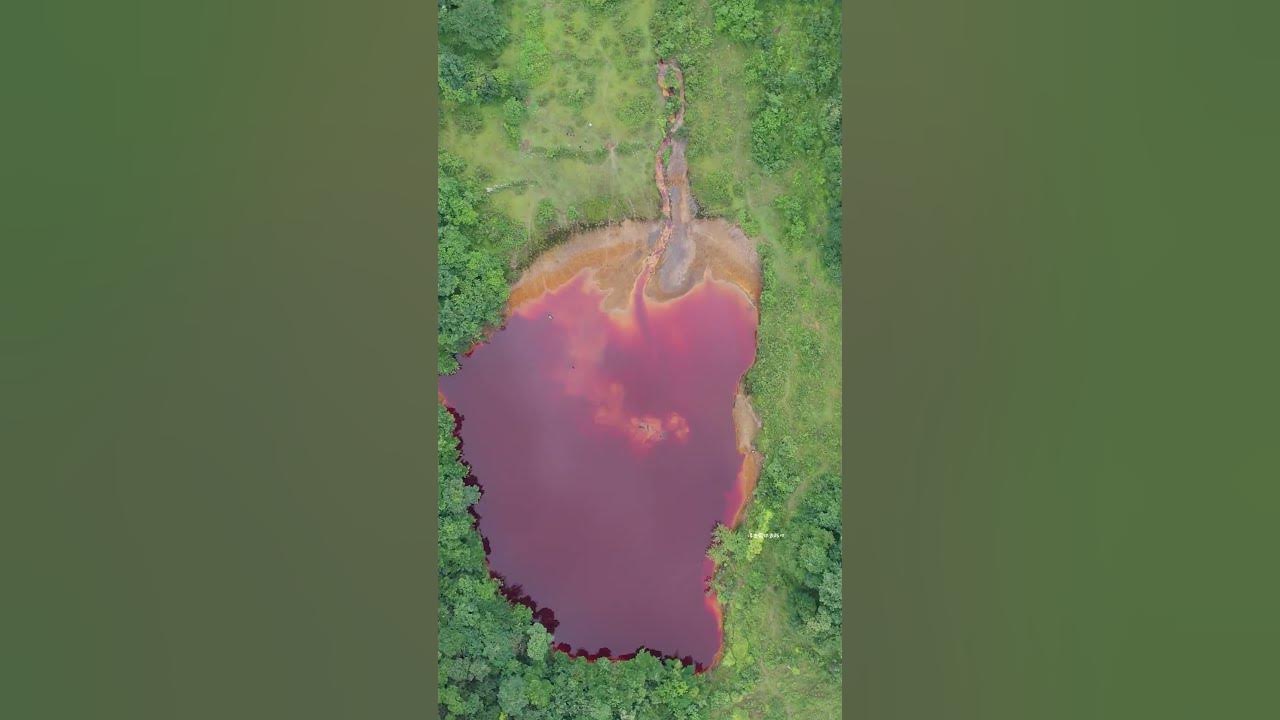 a-brown-red-water-pool-was-discovered-on-the-top-of-a-mountain-in