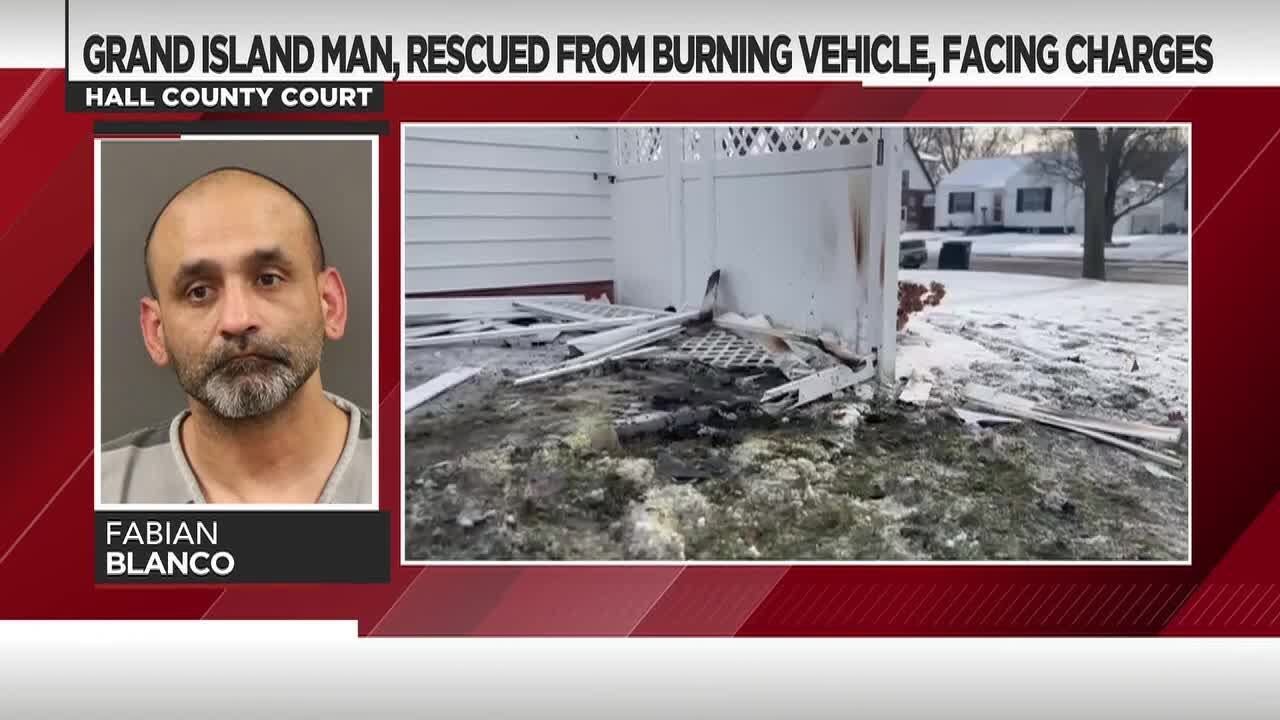 Grand Island man rescued from burning building facing charges - YouTube