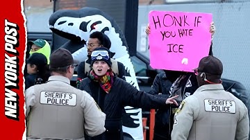 Activists in Bizarre Halloween Costumes Protest ICE Outside Chicago Facility