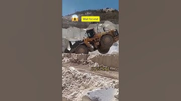 Caterpillar wheel loader lifting the Huge rock #shorts