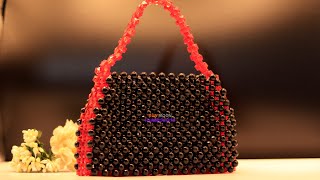 পুতির ব্ল্যাক ফায়ার ব্যাগ/ Beaded black fire bag/ Beaded bag