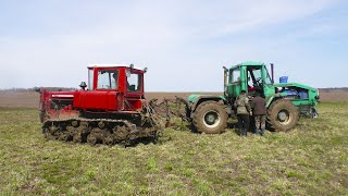 Трактора выехали бороновать поля