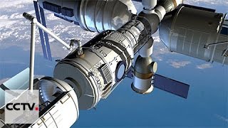 Orbiting micro satellite captures image of Tiangong lab