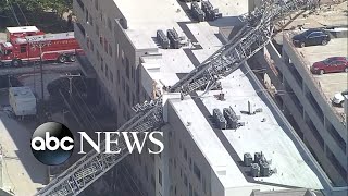 Crane collapses onto Dallas apartment building killing 1 person