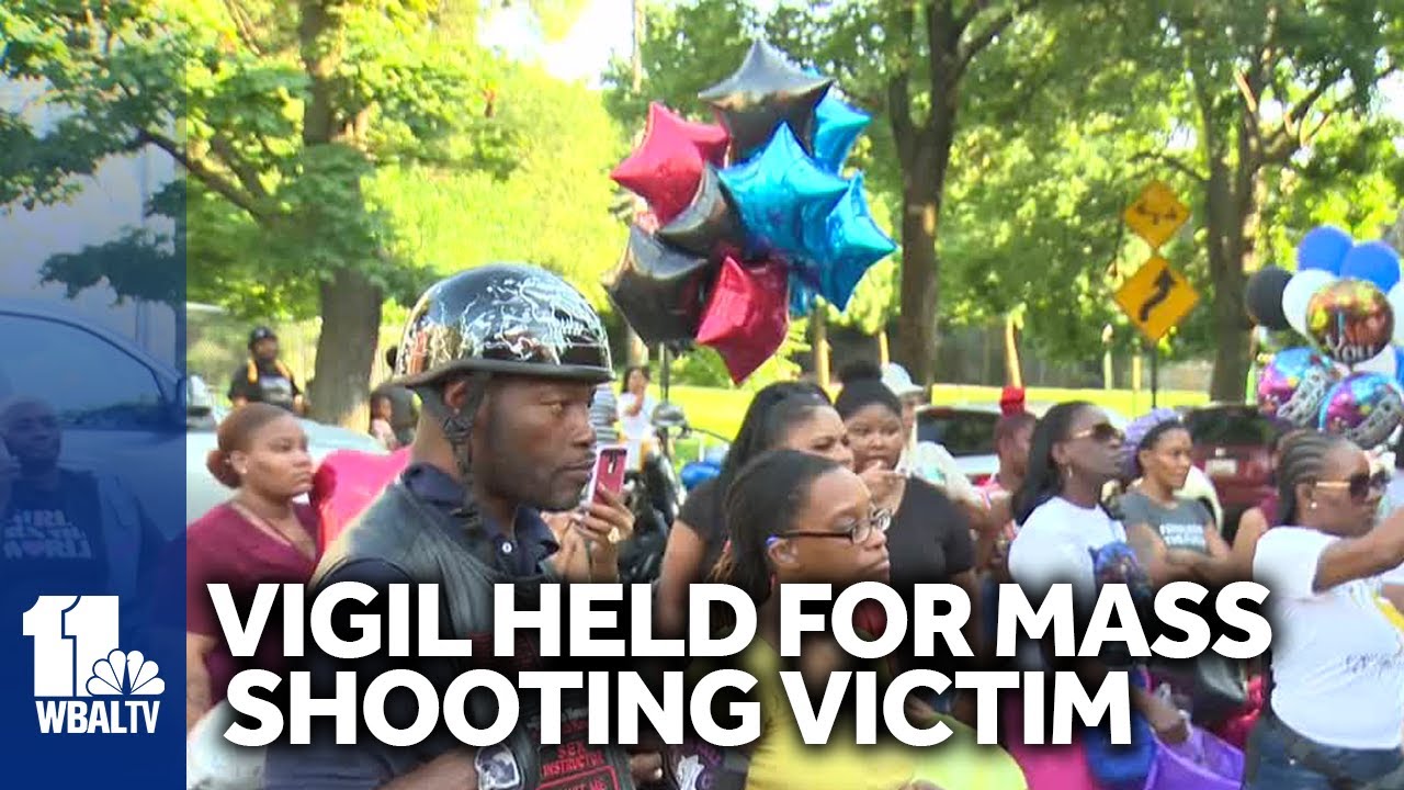 Friends and family hold vigil to remember mass shooting victim - YouTube