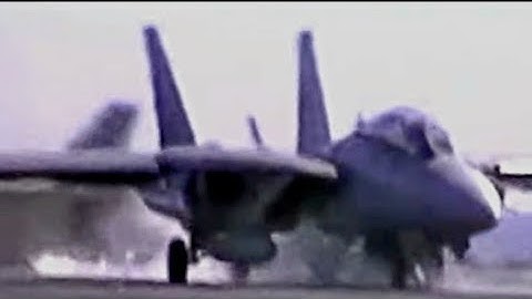 F-14A Tomcat VF-213 Blacklions launch CAT 3 with moderate ocean swells. Check the ocean horizon.