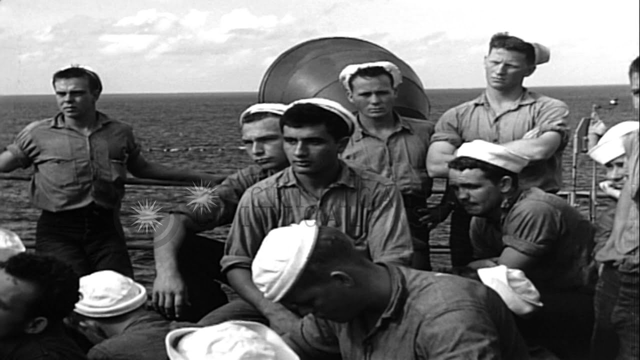 United States Navy officer briefs enlisted personnel and officers aboard a ship i...HD Stock Footage