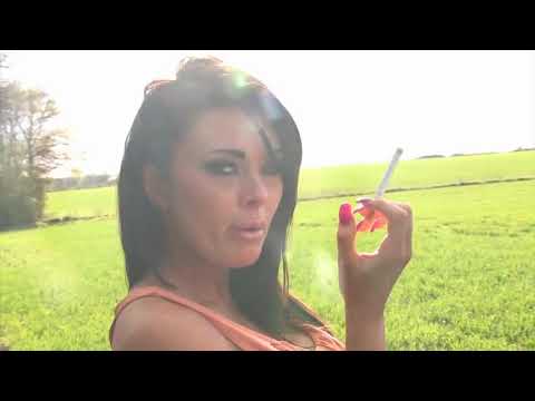 Charley smoking Marlboro reds in a field