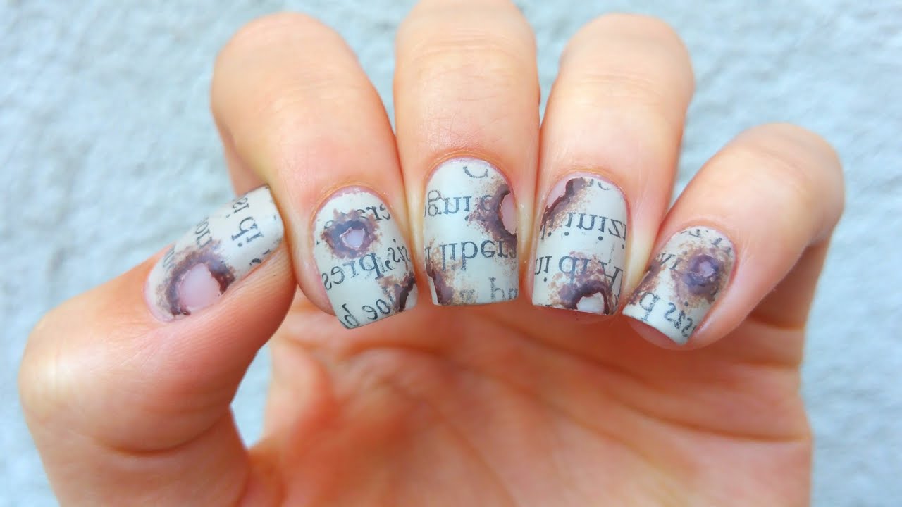 8. Newspaper Nail Art with Rubbing Alcohol - wide 9