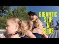 MOM TAKES OUT TODDLER ON GIGANTIC SLIP N SLIDE FOR EPIC PARENTING WIN