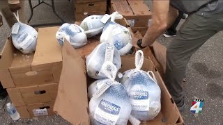 Hundreds of Jacksonville families take home free turkeys from drive-thru giveaway