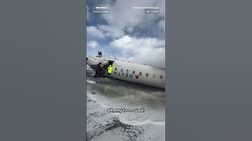 Delta passenger films evacuation after jet overturns on landing