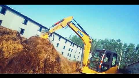 Making haystacks by excavator log grab