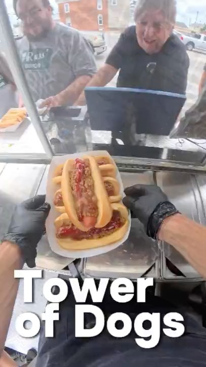 A tower of hotdogs! #pov #hotdogcart #shortsfeed #streetfood #homedog