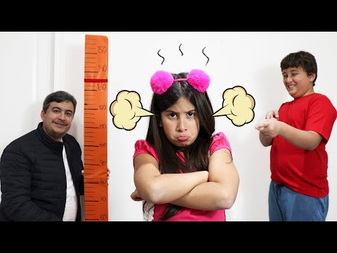 Maria Clara Wants To Be Tall And Jump On The Bounce House