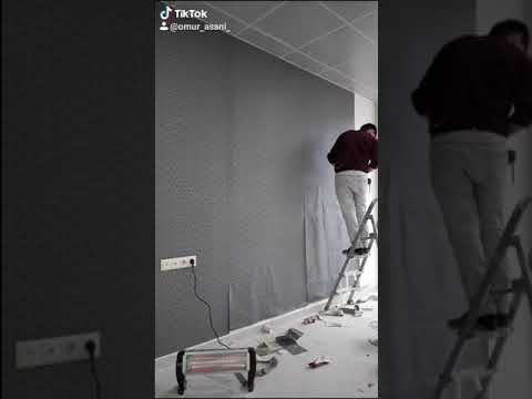 فيديو: افعل ذلك بنفسك بورق الجدران الفينيل