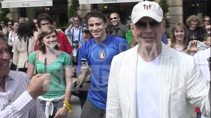 Bruce Willis having a blast as a tourist in Paris