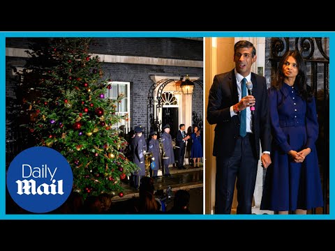 Rishi sunak and wife turn on christmas tree lights at 10 downing street