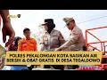 POLRES PEKALONGAN KOTA BAGIKAN AIR BERSIH &amp; OBAT GRATIS  DI DESA TEGALDOWO