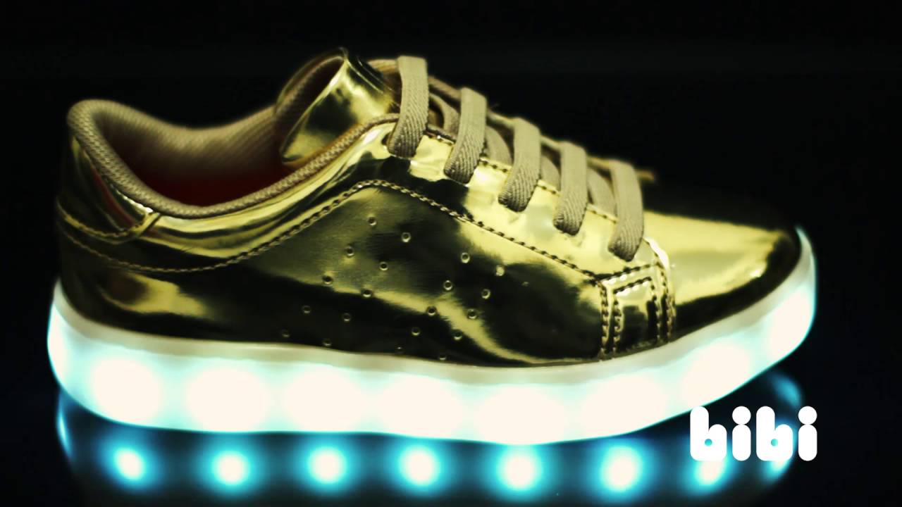 tenis de led dourado feminino