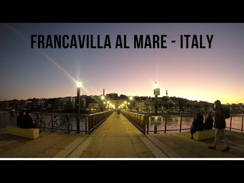 Sunset, sea and beautiful bridge at Francavilla al Mare, Italy